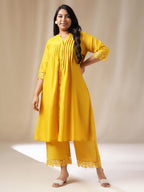 Janasya Pleated Muslin Yellow Solid Band Collar Kurta Set | Grocsy