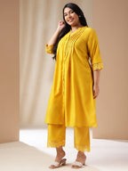 Janasya Pleated Muslin Yellow Solid Band Collar Kurta Set | Grocsy