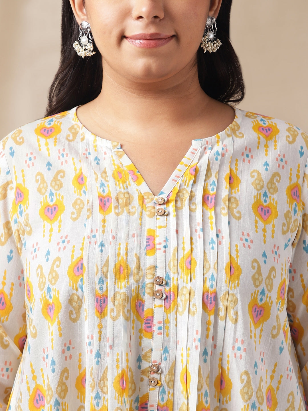 Janasya Pleated Cambric Off White Ikkat Notch Neck Tunic | Grocsy