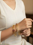 NVR Women Set of 2 Gold Plated Artificial Stone Bangle | Grocsy