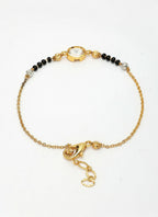 NVR Women Gold-Polished & Black Brass Stone-Studded Hand Mangalsutra Link Bracelet | Grocsy