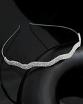 VOJ Silver Plated AD Studded Wave Shaped Hairband | Grocsy