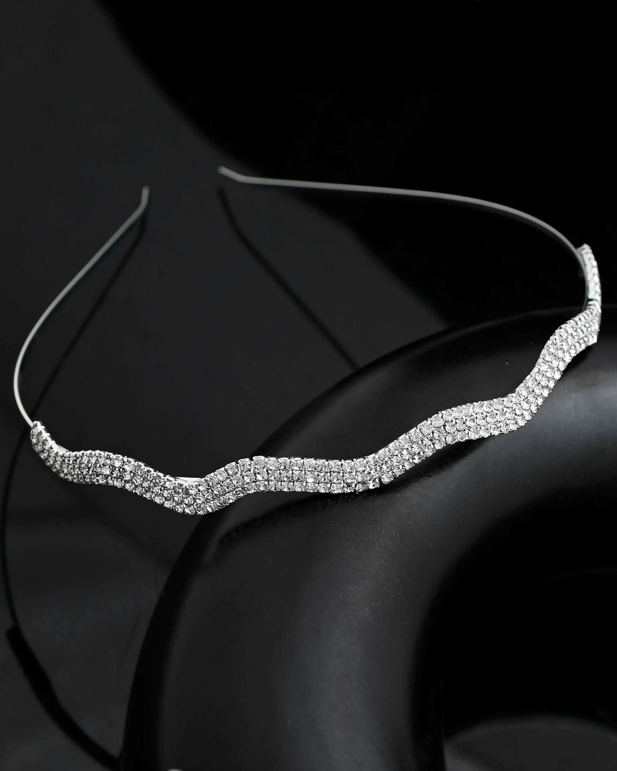 VOJ Silver Plated AD Studded Wave Shaped Hairband | Grocsy