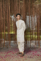 White Kanjivaram Hand Embroidered Pattu Set by Hilo Design | Grocsy