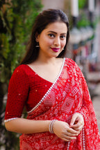 Red Poly Georgette Ethnic Motifs Saree with Unstitched Blouse - Hiral Fashion | Grocsy