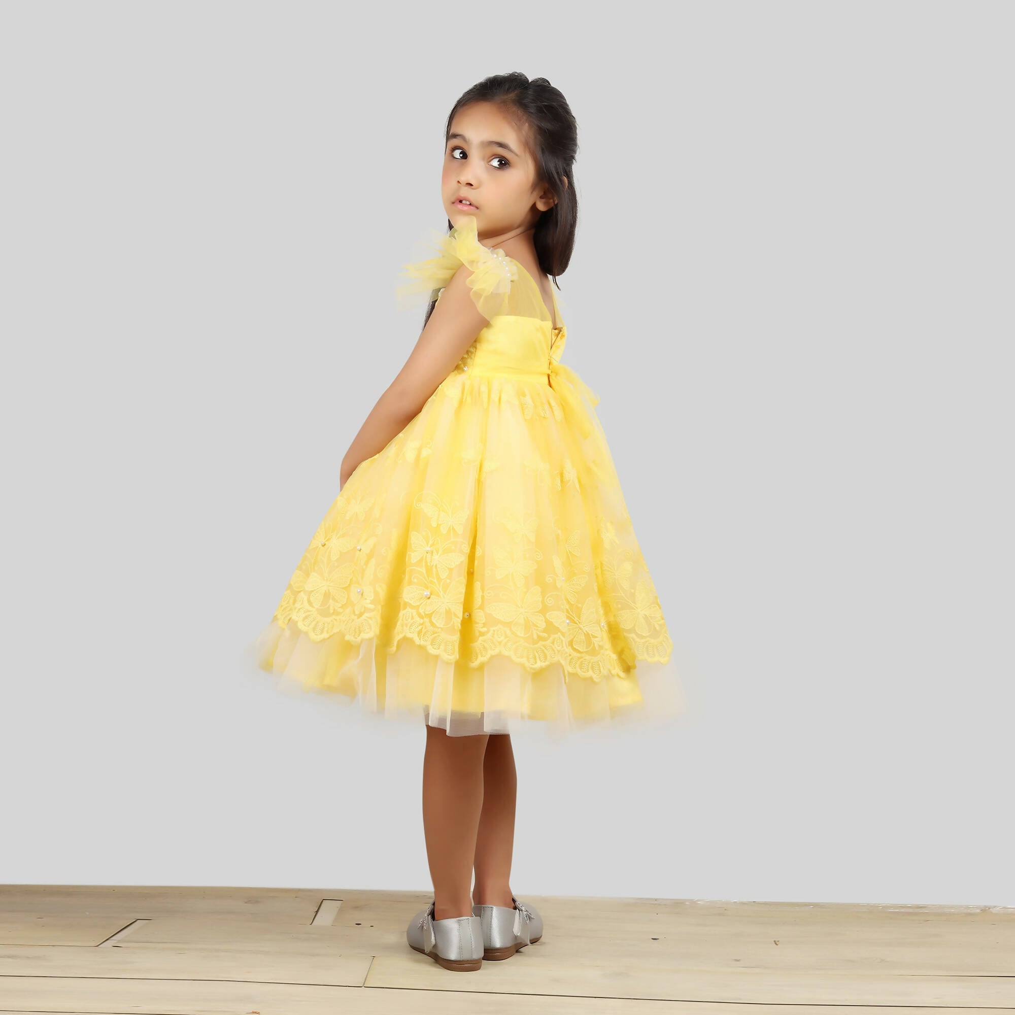Pink Cow Fashions Yellow Dress With Net Layer At Bottom & Frill Sleeves | Grocsy