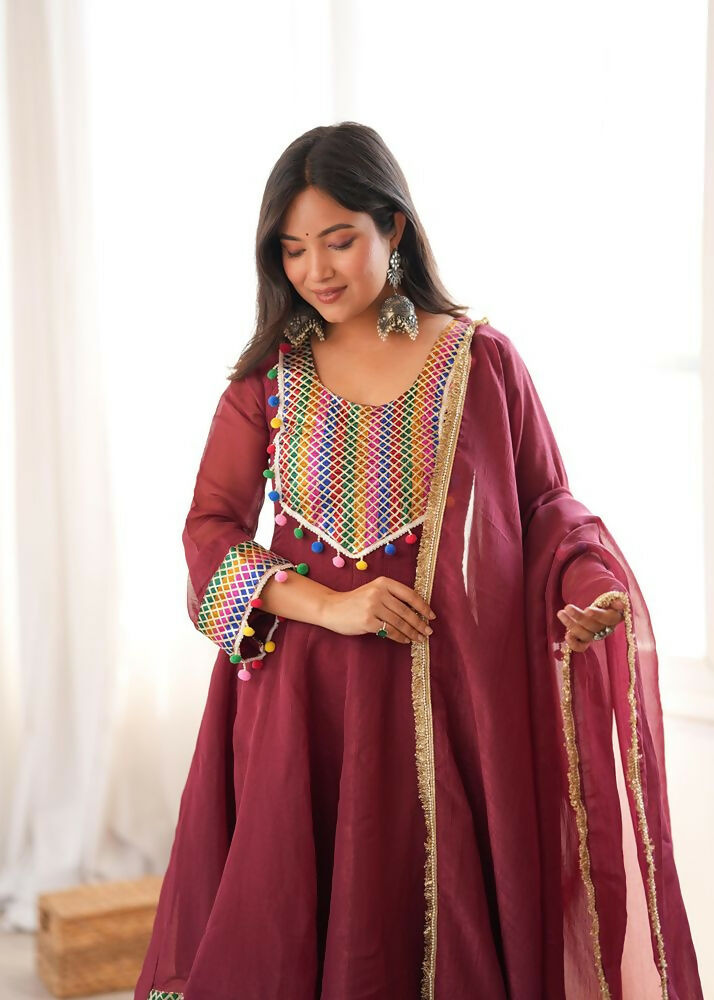 Teeya Creation New Women's Maroon Designer Peplum Kurti with Dhoti Salwar and Multicolor Embroidered Border | Grocsy