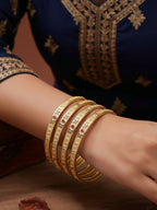 NVR Women Set of 4 Gold Plated Artificial Stone Bangle | Grocsy