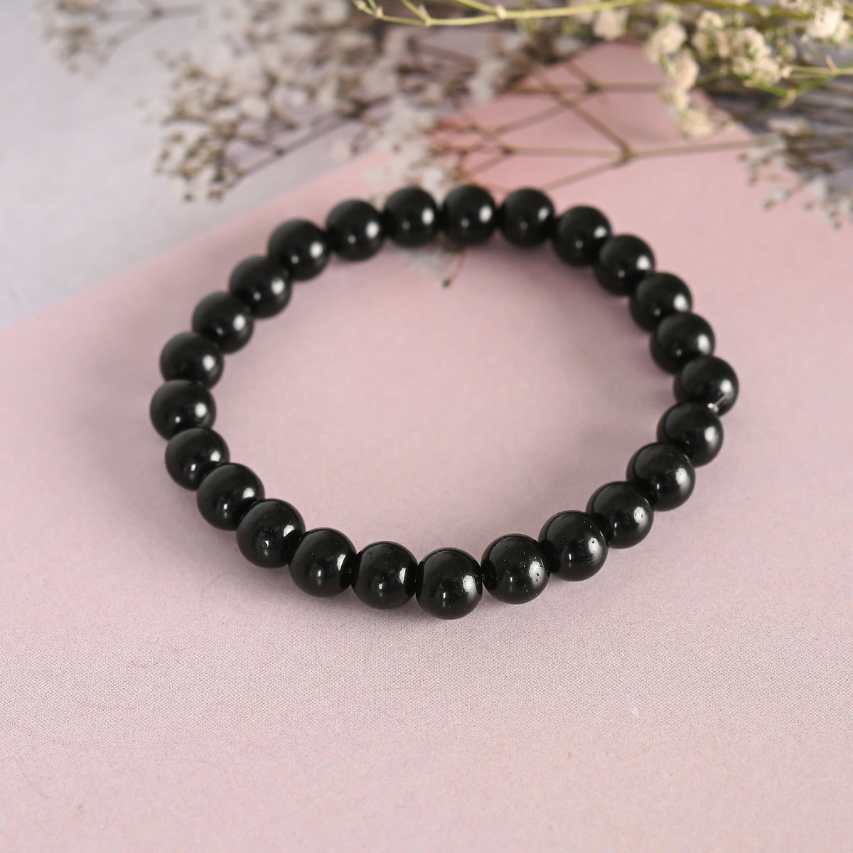 NVR Men & Women Black Marbel Crystal Elasticated Bracelet | Grocsy