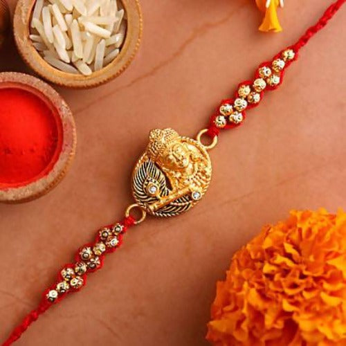 Krishna With Flute Rakhi and Kaju Katli Box | Grocsy