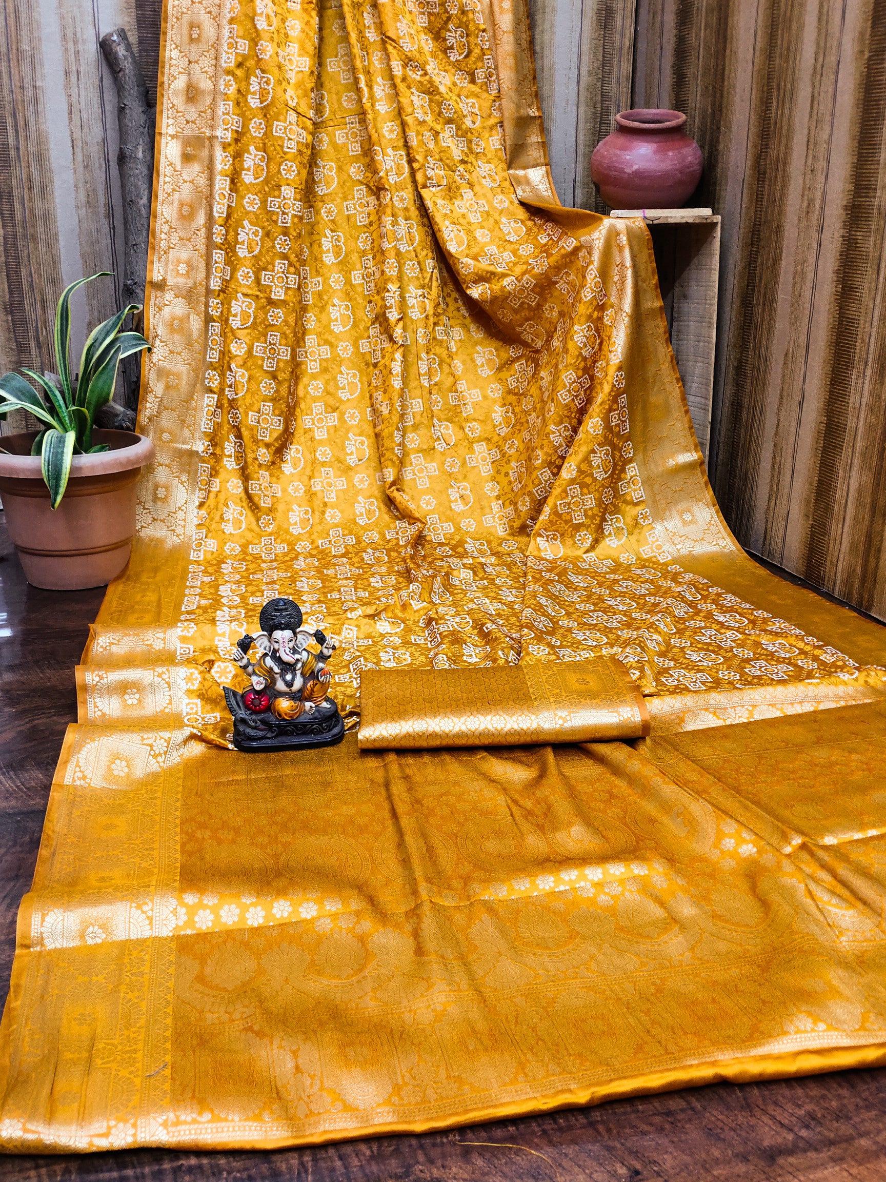 Anaita Yellow Soft Satin Silk Bandhej Print Saree With Kanchi Zari Weaving Border | Grocsy