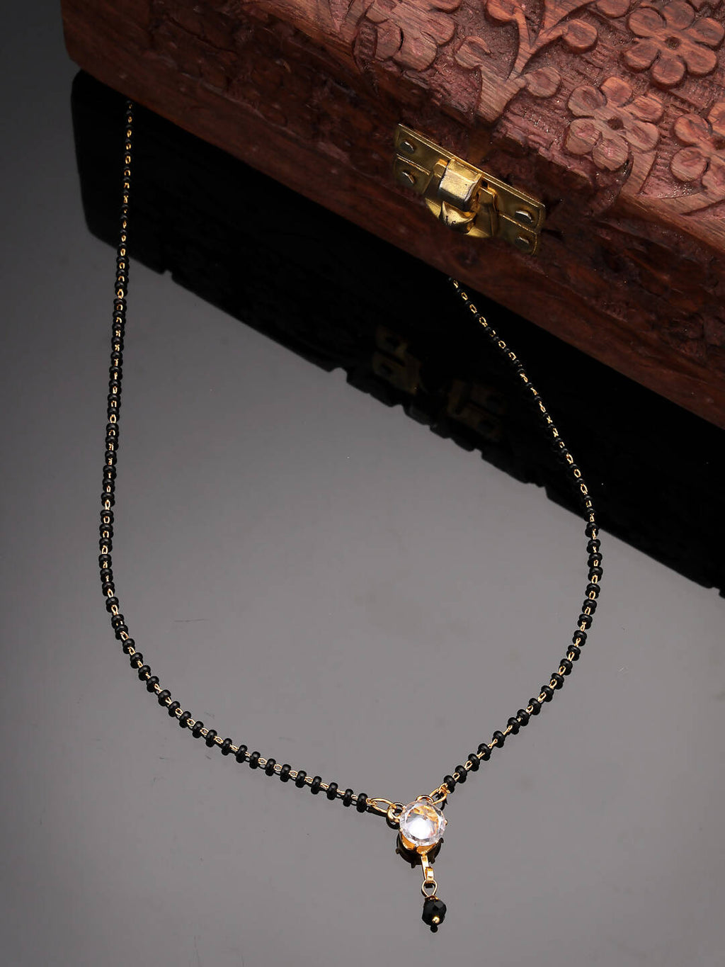 NVR Women Ethnic Gold-Polished Beaded Mangalsutra With Ad Stone | Grocsy