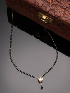 NVR Women Ethnic Gold-Polished Beaded Mangalsutra With Ad Stone | Grocsy