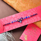 Evil Eye Rakhi With Laddu & Cashew Nuts Combo | Grocsy