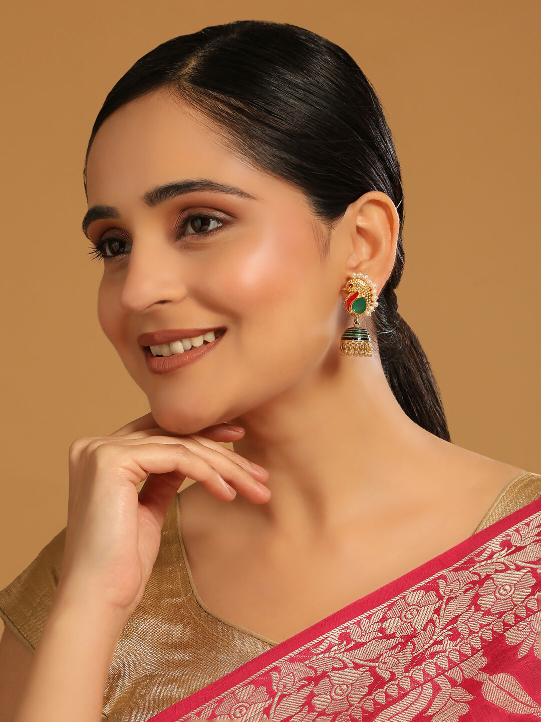 Nuyug 22K Gold Plated Pearls Studded Contemporary Shaped Enamel Jhumkas | Grocsy