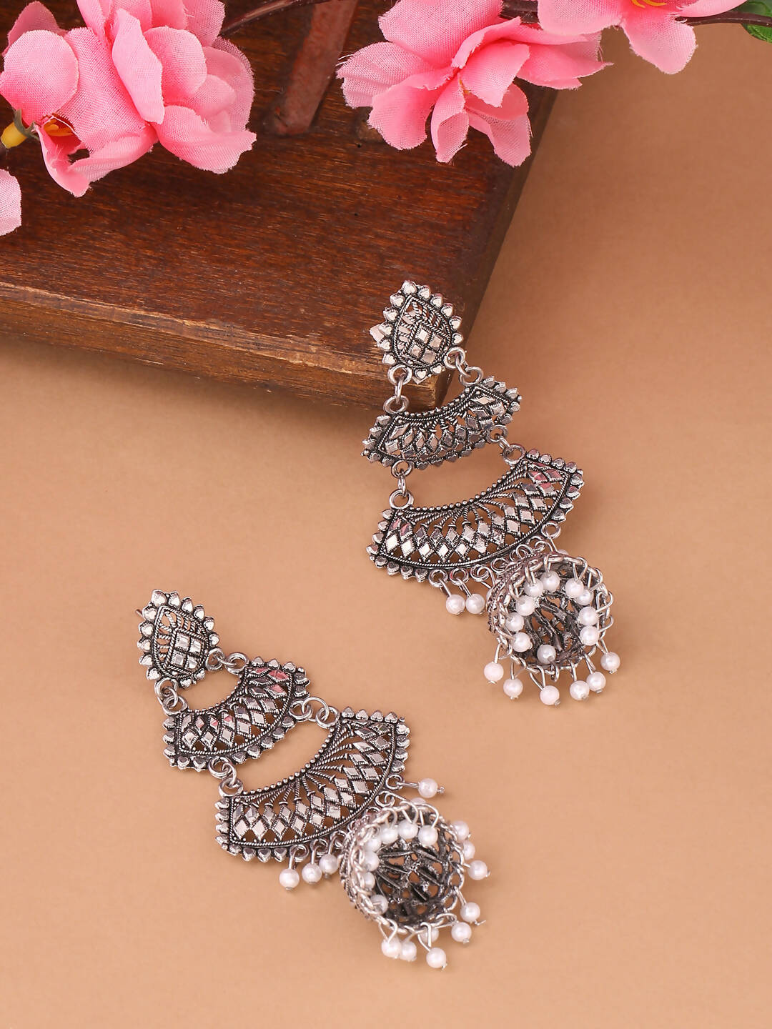 NVR Women Silver Toned Contemporary Jhumka Earrings | Grocsy