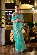 Vastranavya Turquoise Embroidery Work Shimmer Chiffon Saree with Unstitched Blouse | Grocsy