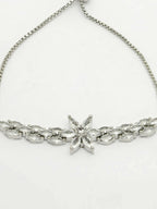NVR Women Silver-Plated Handcrafted American Diamond Link Bracelet