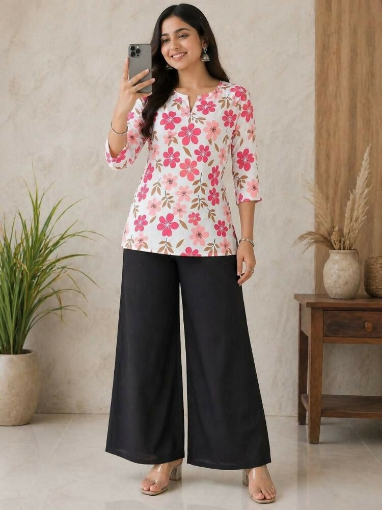 Teeya Creation Women White & Rani Pink Bold Floral Printed Cotton Kurti with Black Wide-Leg Palazzo Set | Grocsy