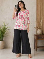 Teeya Creation Women White & Rani Pink Bold Floral Printed Cotton Kurti with Black Wide-Leg Palazzo Set | Grocsy