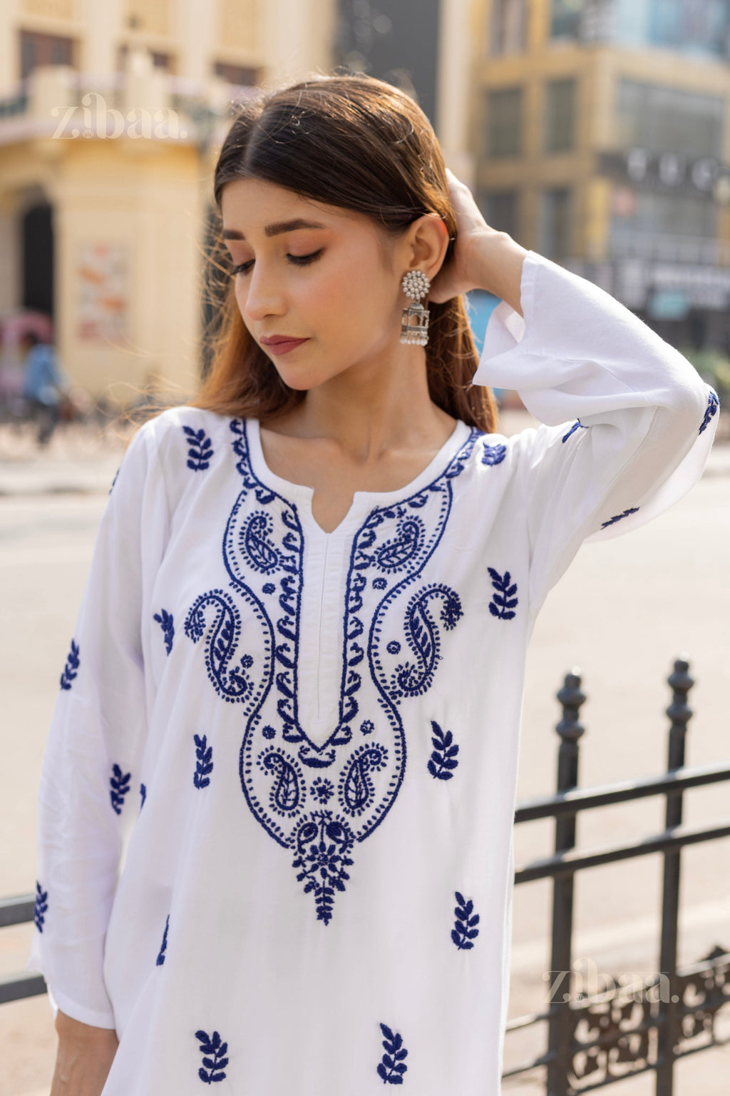 Zibaa Rayon White Chikankari Kurti with small motifs | Grocsy
