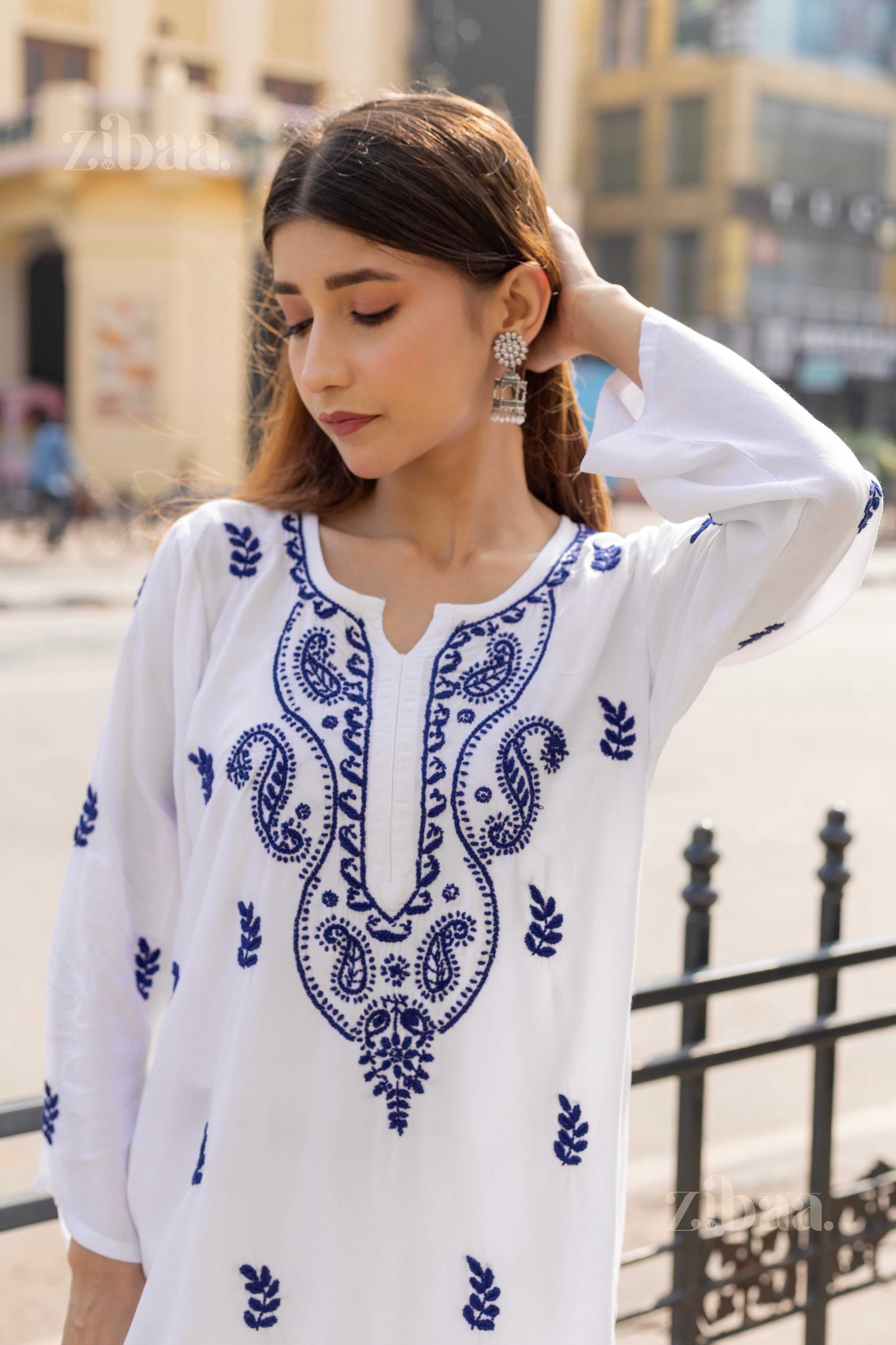 Zibaa Rayon White Chikankari Kurti with small motifs | Grocsy