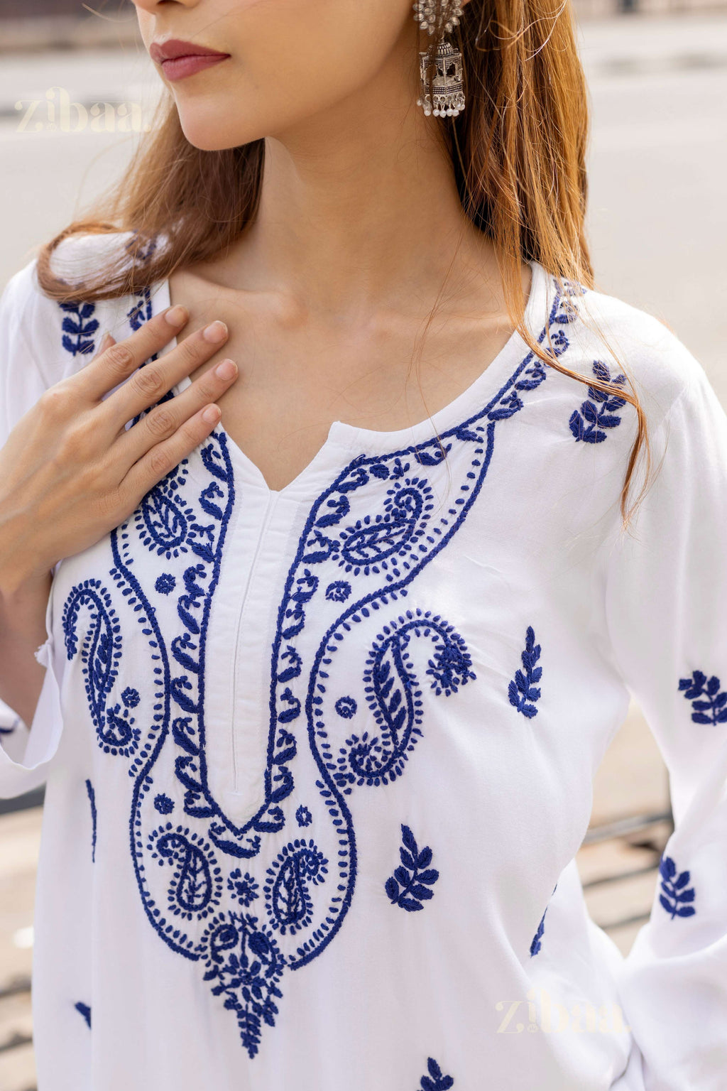 Zibaa Rayon White Chikankari Kurti with small motifs | Grocsy
