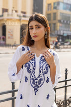 Zibaa Rayon White Chikankari Kurti with small motifs | Grocsy