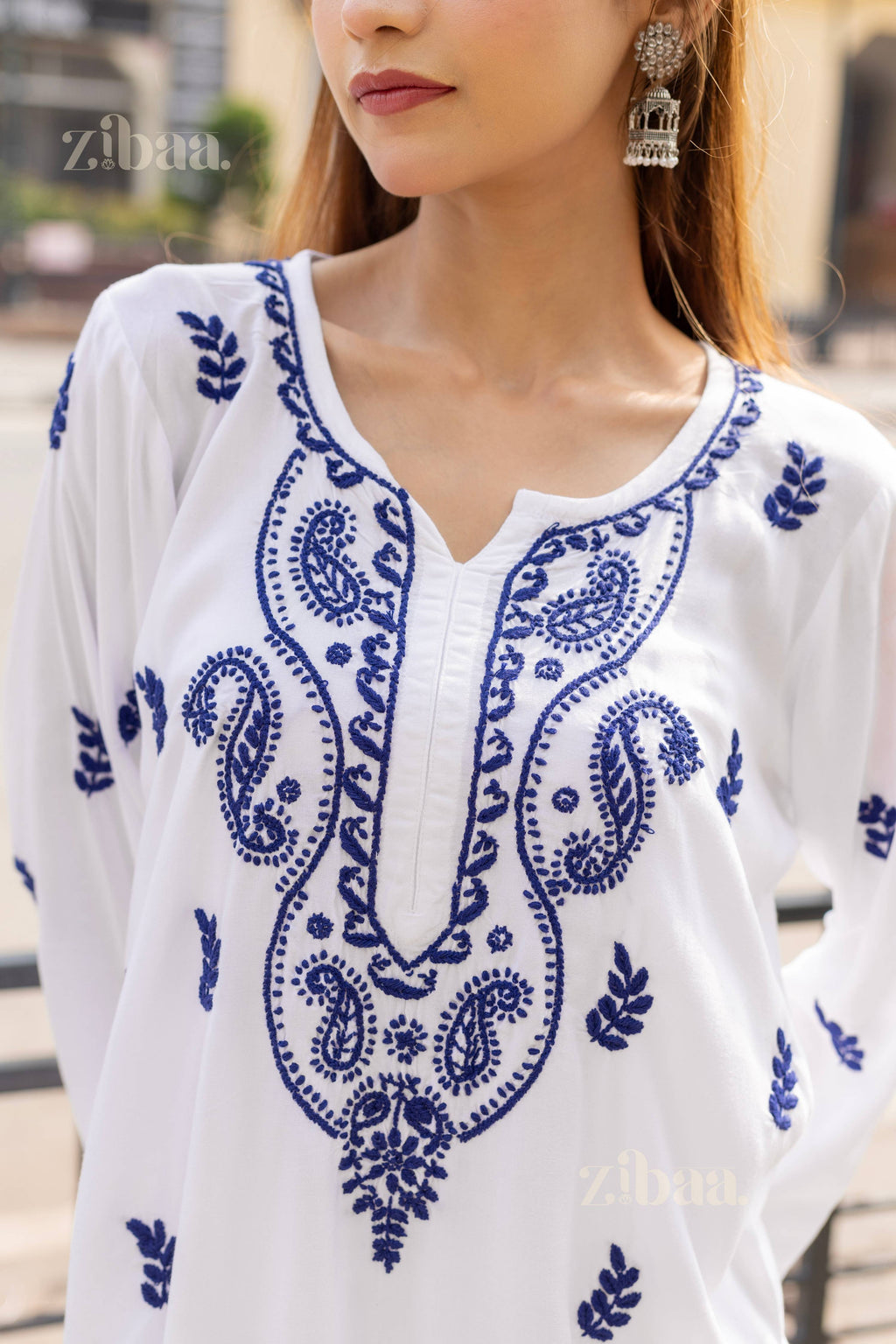 Zibaa Rayon White Chikankari Kurti with small motifs | Grocsy