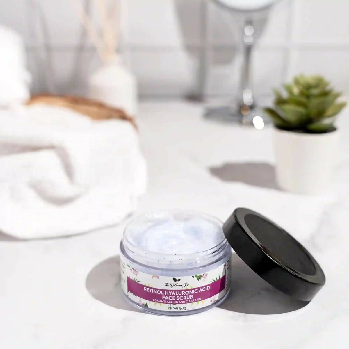 The Wellness Shop Retinol And Hyaluronic Acid Face Scrub | Grocsy