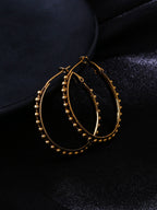 NVR Women Gold Toned Beaded Circular Earrings | Grocsy