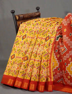 Yellow And Red Coloured Patola Print Semi Chanderi Saree By Gayathri Reddy Designer Studio | Grocsy