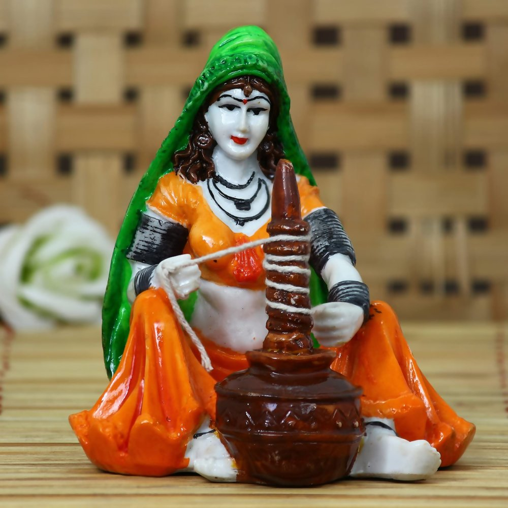 eCraftIndia Rajasthani Lady Using Makhan Handi Polyresin Statue | Grocsy
