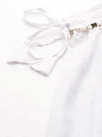 TAG 7 Women White Solid Flared Palazzos | Grocsy