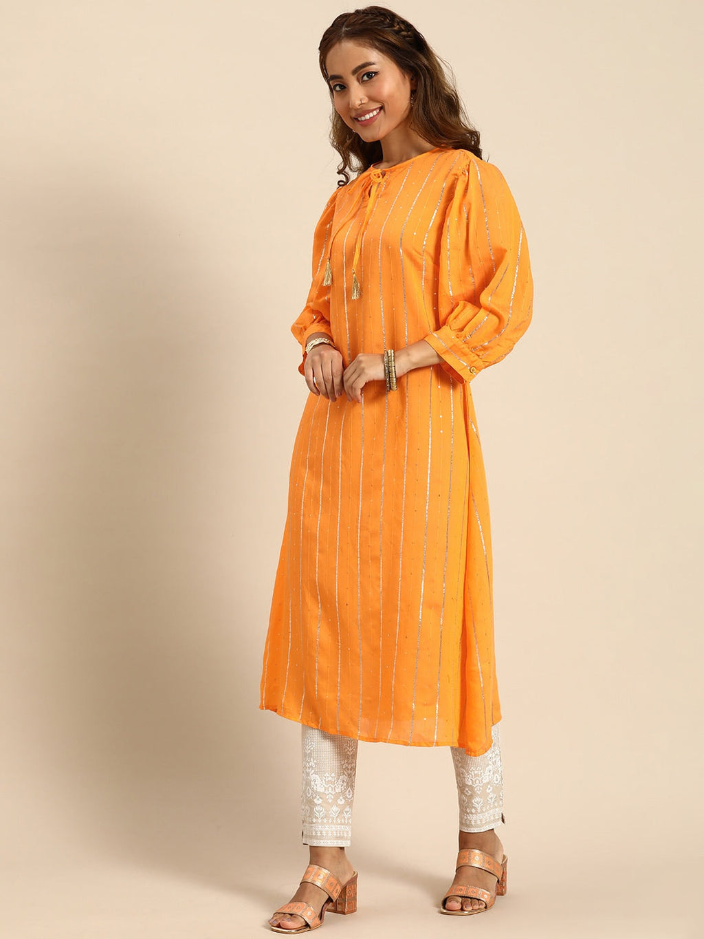 Sangria Women Jacquard Chanderi Silk Tie-Up Neck Puff Sleeves Kurta With Sequin Detail | Grocsy