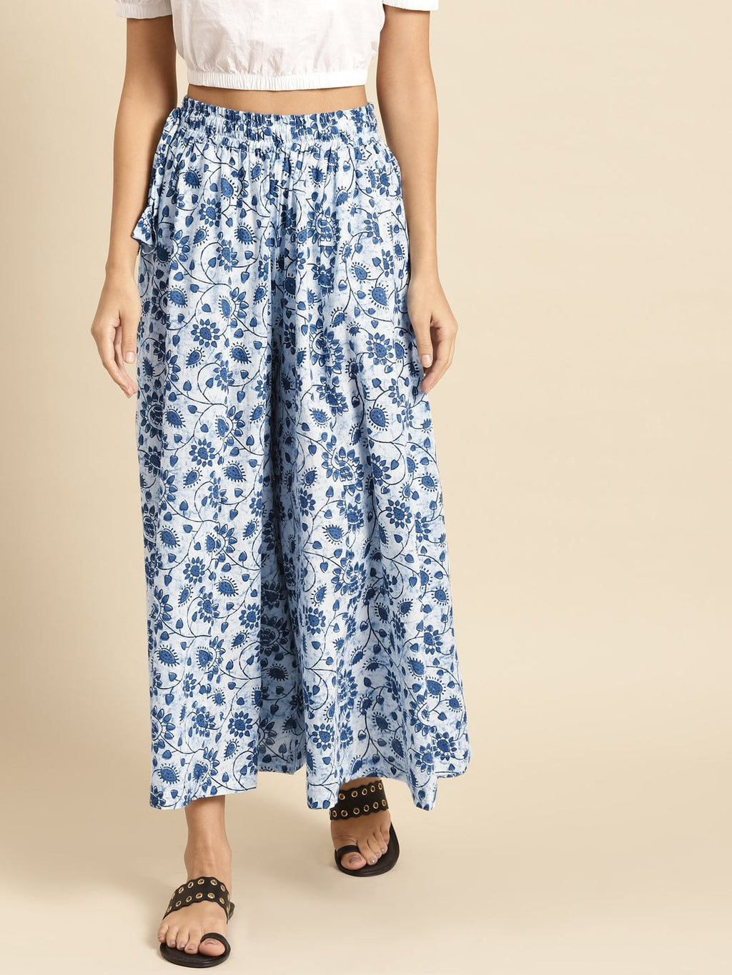 TAG 7 Women White & Blue Printed Pure Cotton Flared Palazzos | Grocsy