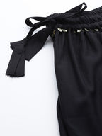TAG 7 Women Black Solid Flared Palazzos | Grocsy