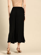 TAG 7 Women Black Solid Flared Cropped Palazzos | Grocsy