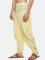 Sethukrishna Men Yellow Solid Dhoti Pant | Grocsy