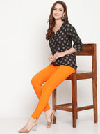 TAG 7 Women Orange Solid Leggings | Grocsy
