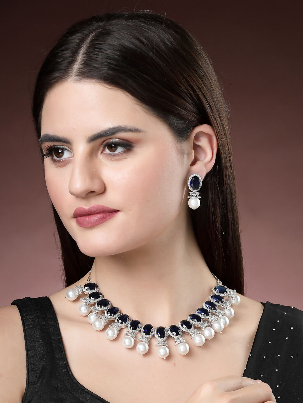 NVR Women's Silver-Plated Blue American Diamond Studded Handcrafted Jewellery Set | Grocsy