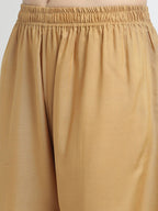 TAG 7 Women Beige Solid Flared Palazzo | Grocsy