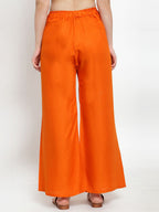 TAG 7 Women Orange Solid Wide Leg Palazzos | Grocsy