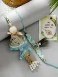 NVR Women & Men Set of 2 Blue Krishna Pearl Bhaiya Bhabhi Rakhi With Roli Chawal & Chocolate | Grocsy