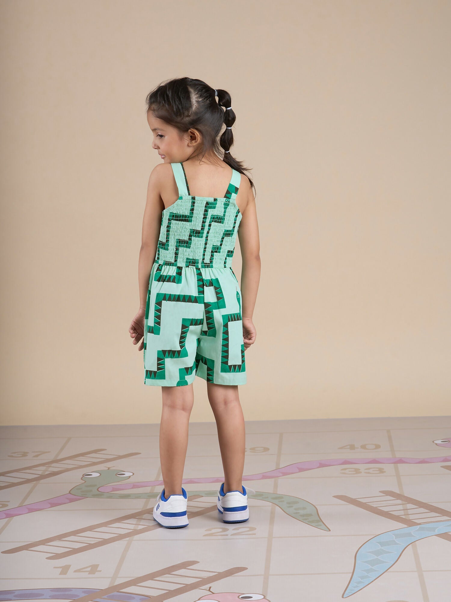 Snakes and Ladders Girls Green Table Print Jumpsuit from Siblings Collection | Grocsy