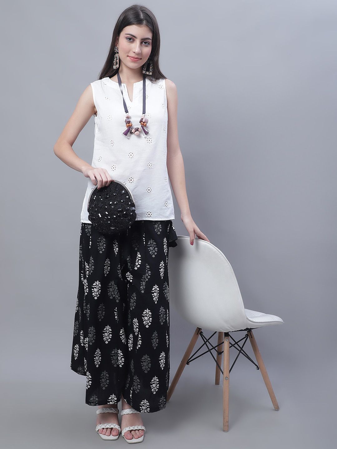 TAG 7 Women Floral Printed Flared Palazzos | Grocsy