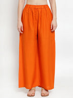 TAG 7 Women Orange Solid Wide Leg Palazzos | Grocsy