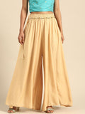 TAG 7 Women Beige Solid Flared Palazzos | Grocsy
