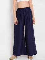 TAG 7 Women Navy Blue Solid Flared Palazzos | Grocsy