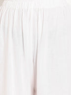 TAG 7 Women White Solid Straight Palazzos | Grocsy
